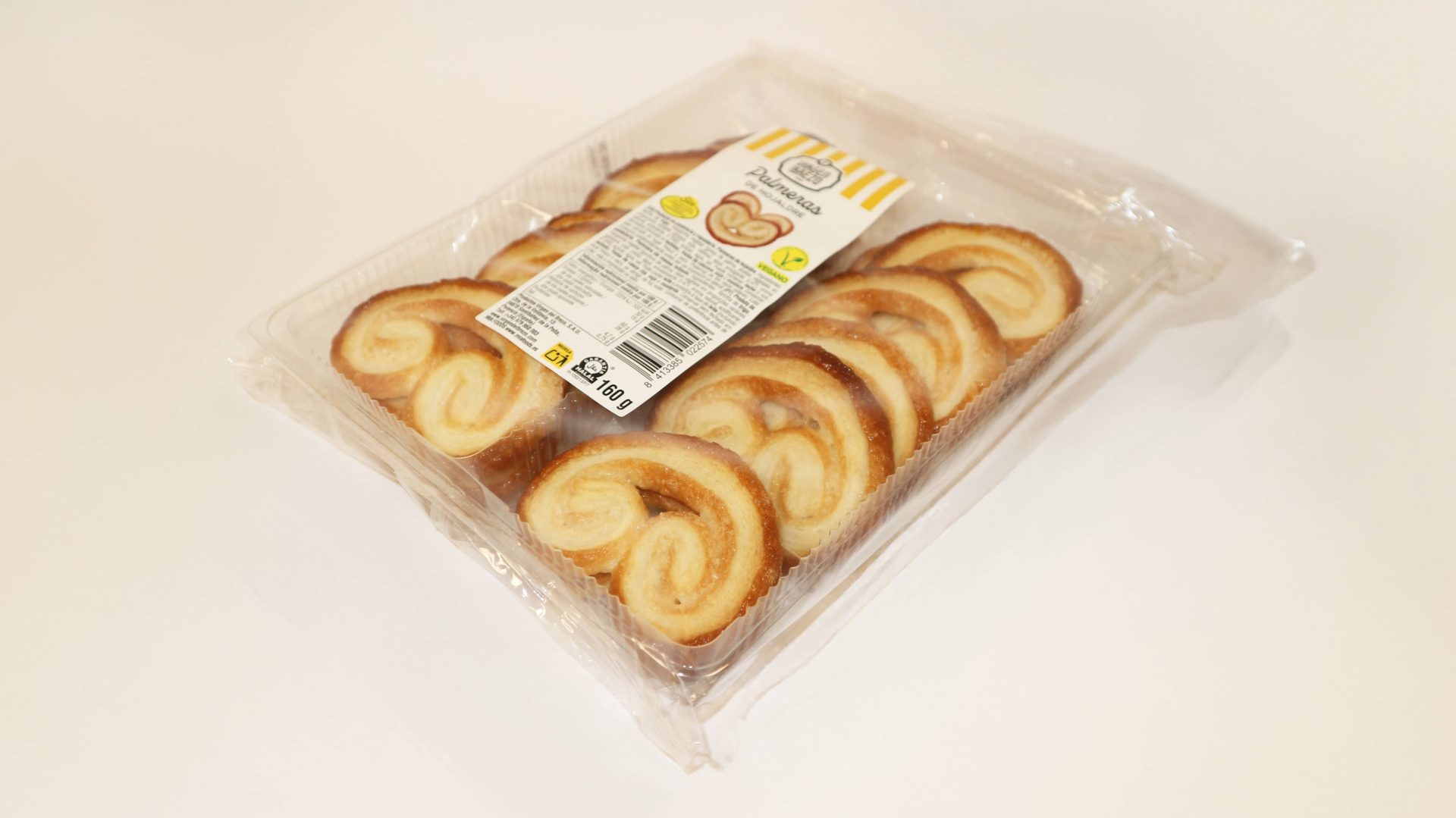Mini palmeras Virgen del Brezo, hojaldre dorado en formato pequeño.