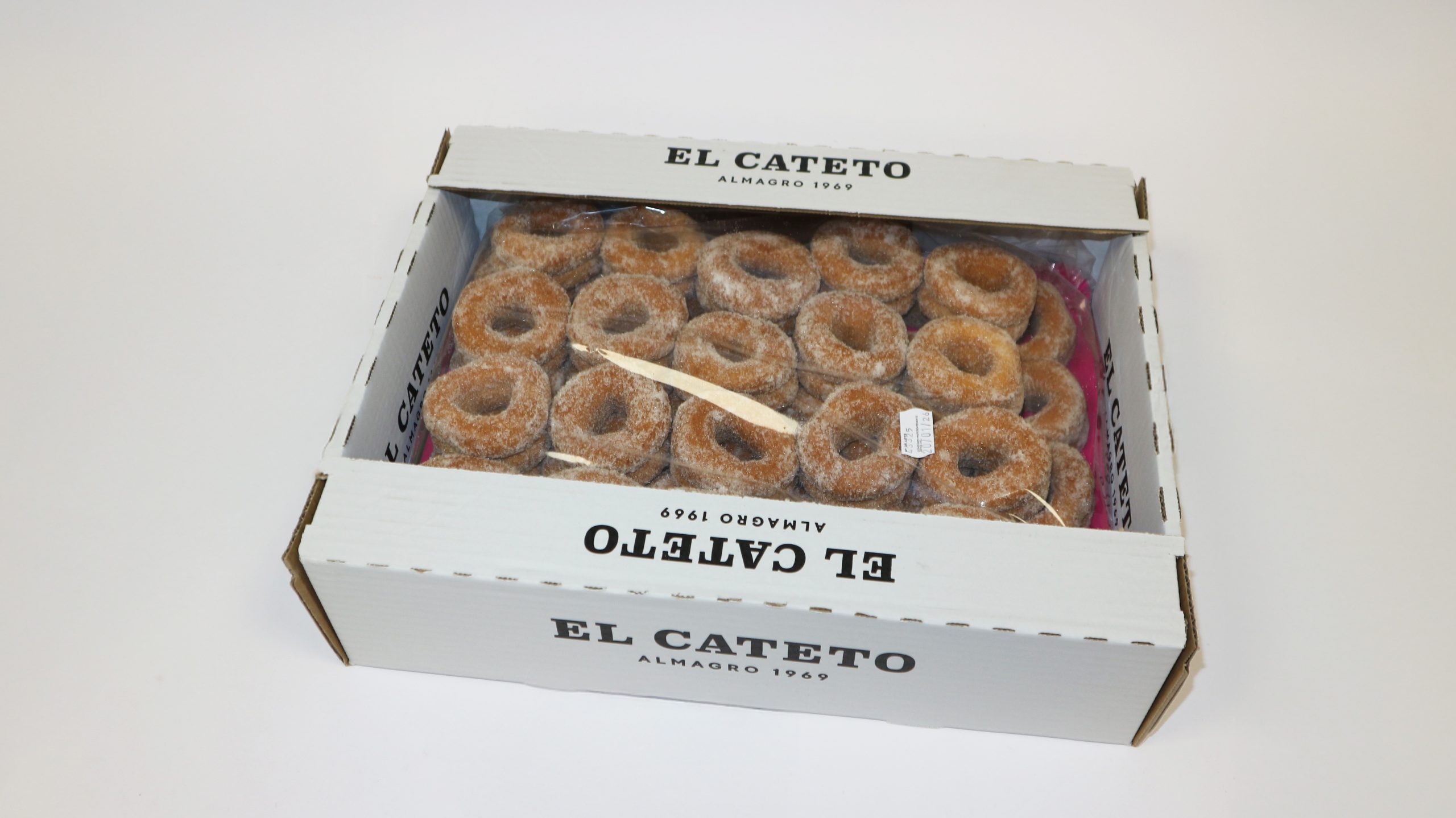Rosco frito doble El Cateto esponjoso y cubierto de azúcar